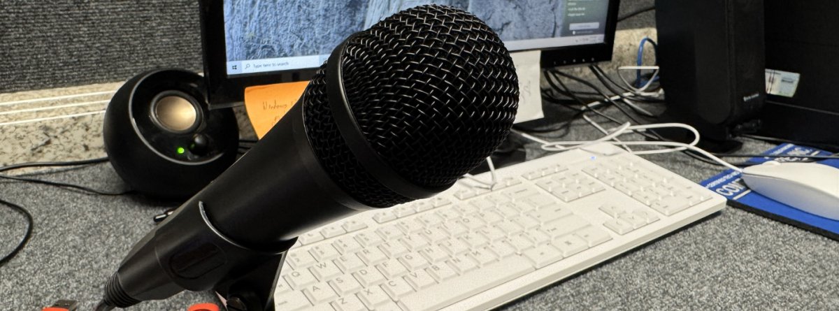 Up close photo of a black microphone that is used at the ICBM offices to record for the Audio Ministry.