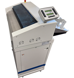 Picture of the form burster that is used to cleanly break apart the continuous fed braille paper.